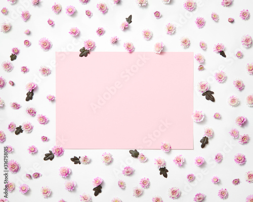 Flowers frame with light pink square for greeting. © artjazz