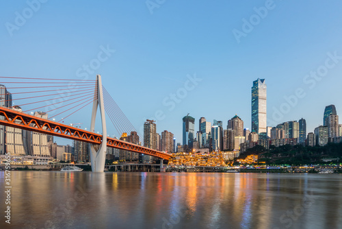 Night view of Hongyadong and skyline along Jialing River in Chongqing, China