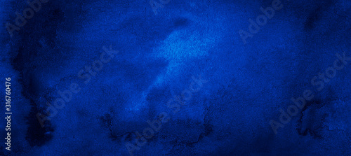 Dark blue watercolor background with torn strokes and uneven divorce. Abstract indigo background for design, template and pattern.