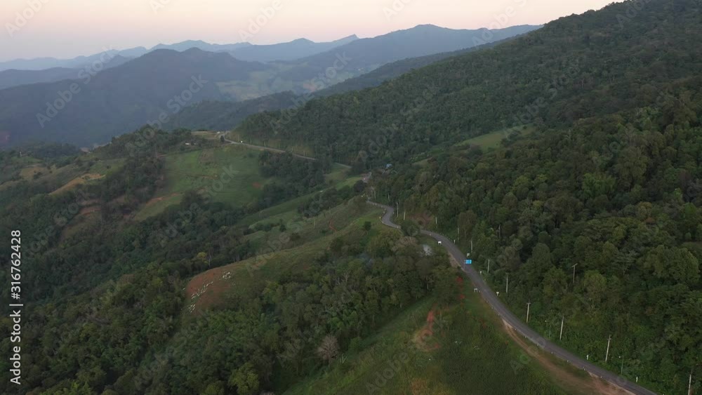 Aerial view of the winding mountain roads and beautiful roads suitable for holiday driving in Chiang Rai, Thailand. Aerial view of the winding mountain roads and beautiful roads suitable for holiday driving in Chiang Rai, Thailand.