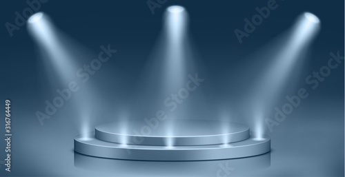 Round podium illuminated by searchlights. Blank background for the presentation.