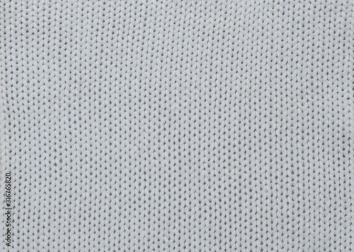 Cotton handmade knitted large blanket, trendy concept. Close-up of knitted blanket, knit background, white background.