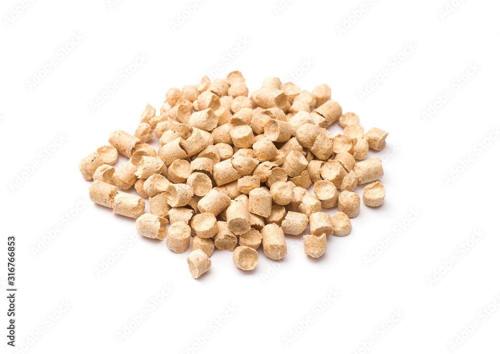 A bunch of filler for hamsters on a white background, isolate A bunch of filler for hamsters on a white background, isolate