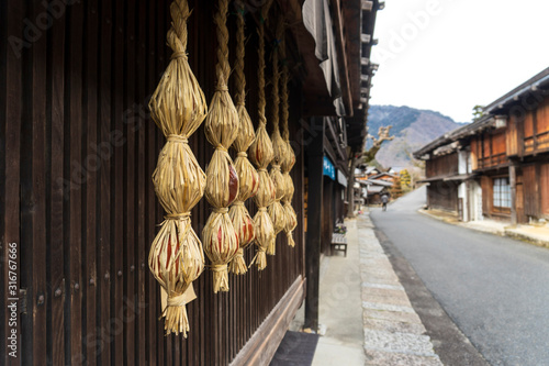 柿を包んで干し柿を作る風景／Tsumago-juku is an old town in Nagano Prefecture, Japan. photo