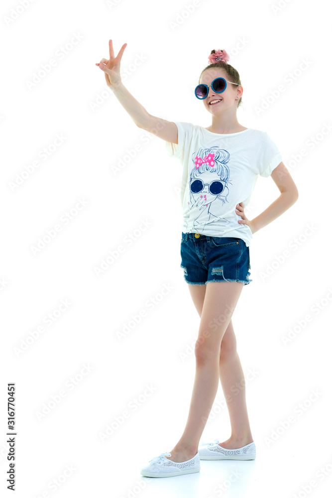 Little girl holding two fingers up. Gesture. Little girl holding two fingers up. Gesture.
