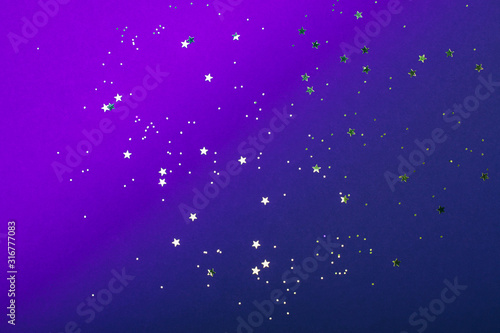 Trendy neon background with stars. Violet and blue colors. The concept of celebrations, the Day of St. Valentine, Christmas, New Year, holiday, birthday, etc.