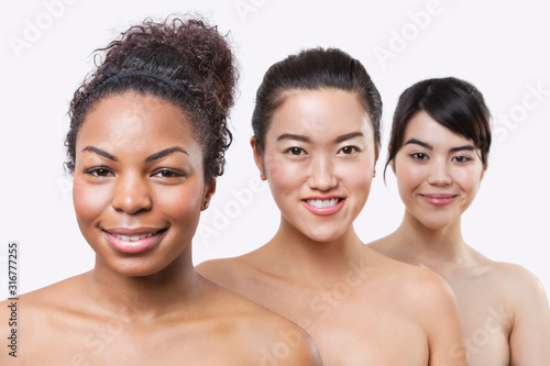 Beauty portrait of young multi-ethnic women over white background