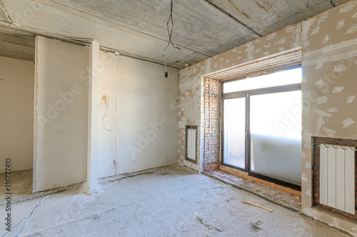 Russia  Moscow- September 10  2019  interior room apartment rough repair for self-finishing. interior decoration  bare walls of the room  stage of construction