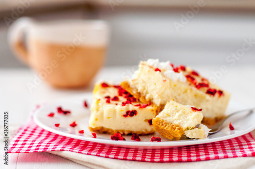 Homemade cheesecake pieces with dried strawberry