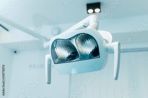 Close-up of the lamp in dental clinic. Interior of dentist office. Health care and medicine.  