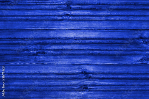 Blue wooden textured background. View from front.