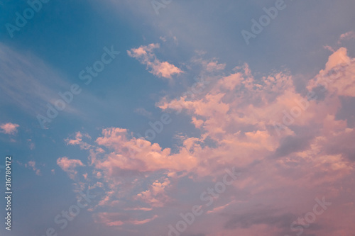 Dramatic clouds in the sky during sunset © Shiv Mer