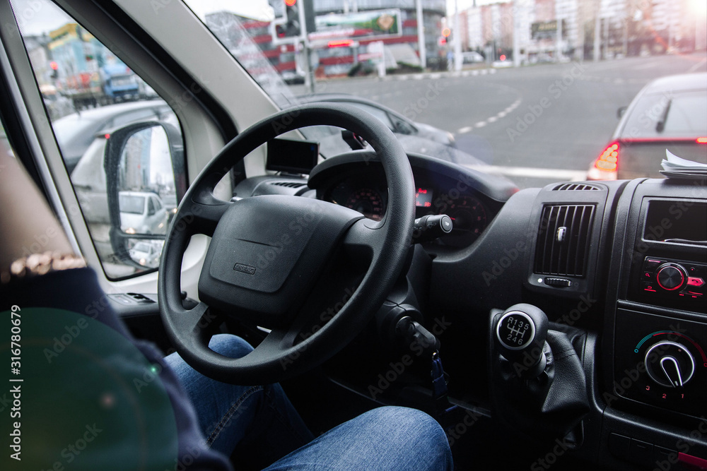 Fototapeta premium work of the truck driver. Caucasian trucker on a long expedition.