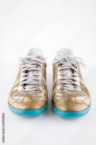 Pair of casual shoes over white background