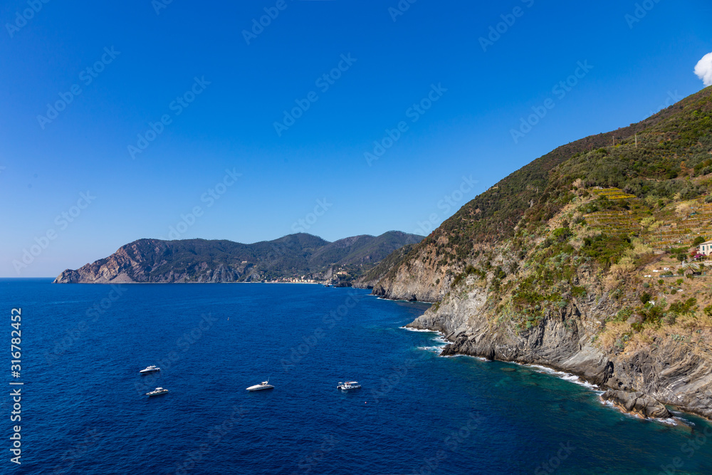 Cinque Terre Nature Reserve and small towns with vibrant colorful houses in La Spezia, Italy Cinque Terre Nature Reserve and small towns with vibrant colorful houses in La Spezia, Italy