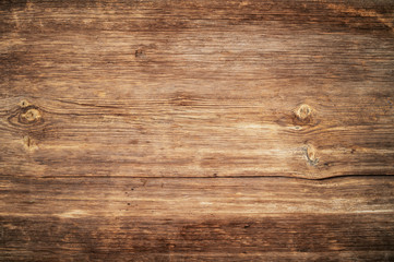 Brown unpainted natural wood with grains for background and texture.