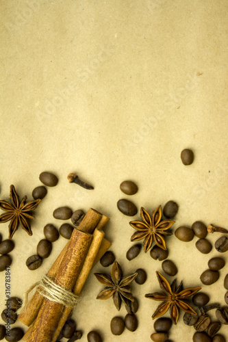 Spiced spices, cinnamon sticks, cardigan, orange slices, coffee grains, aroma and taste, flat lay style