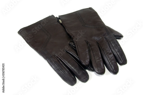 Brown leather gloves on a white background. Isolated. 