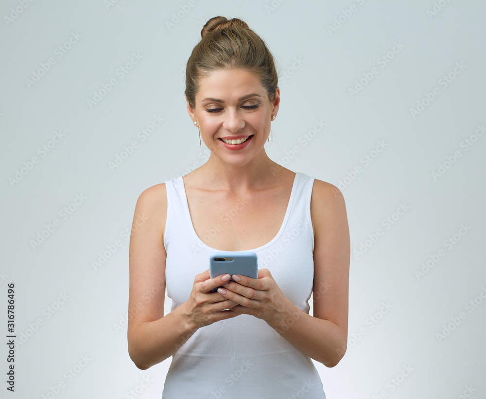 woman in white sporty dress using smartphone. woman in white sporty dress using smartphone.
