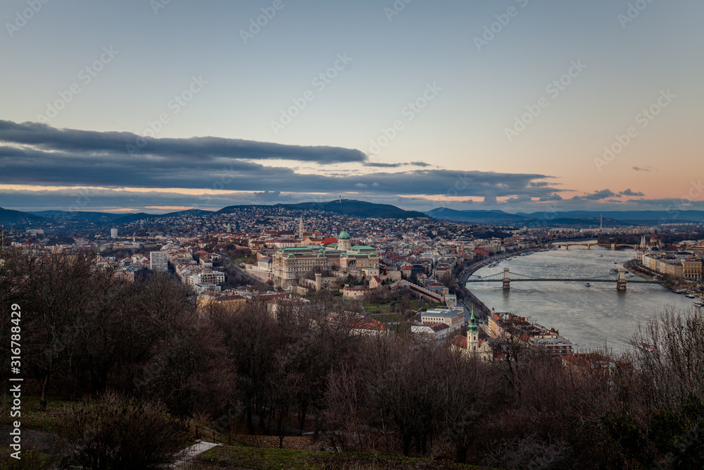 Fototapeta premium Aerial view Budapest, Hungary by sunset. Buda castle, Chain bridge and Parliament building