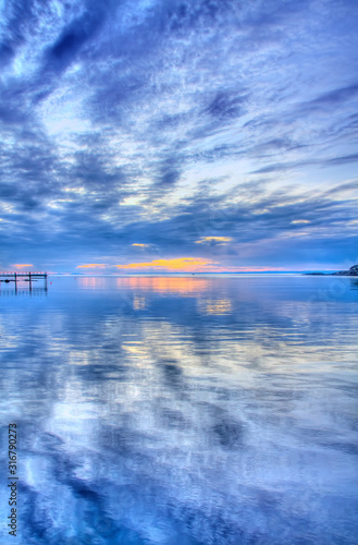 Cold Afternoon with Calm Sea and Water Reflections in Aarefjorden, Moss, Norway photo