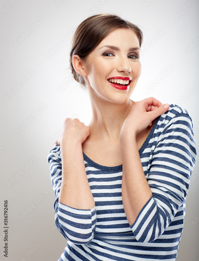Smiling beautiful woman in striped dress. Smiling beautiful woman in striped dress.