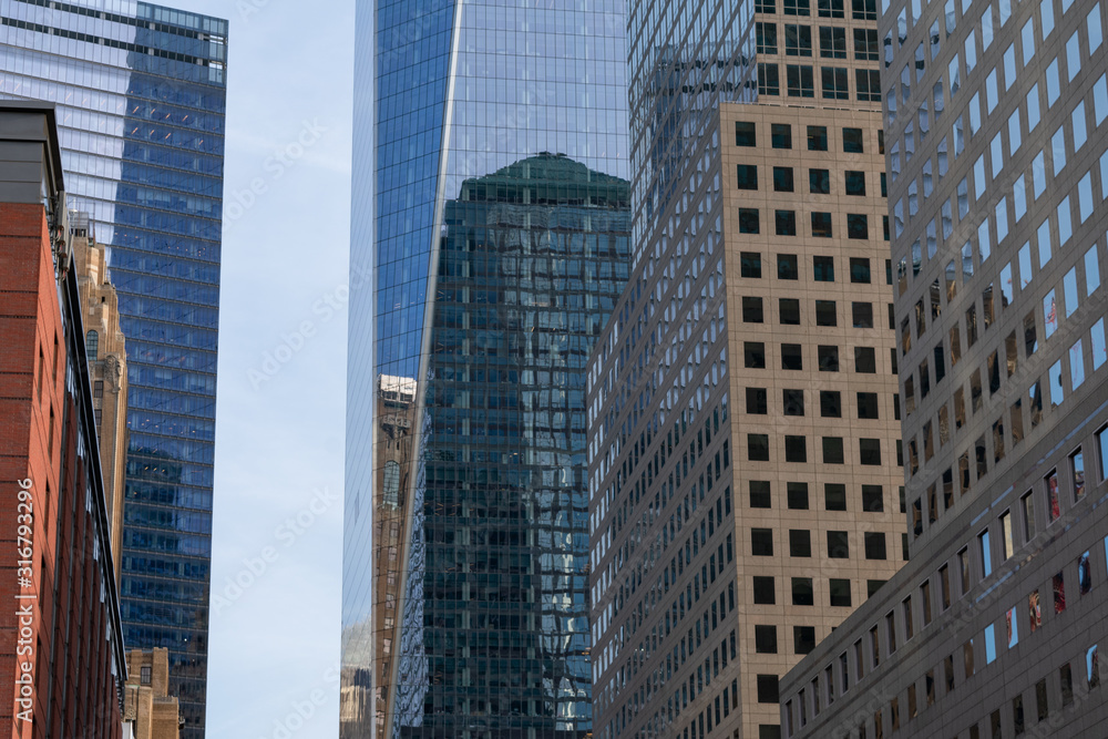 Lower Manhattan Street with Office Buildings and Skyscrapers in New York City