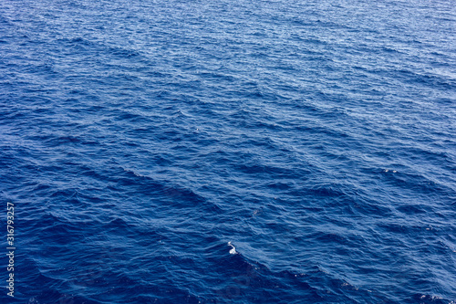 sea or ocean background. Blue sea water in calm.