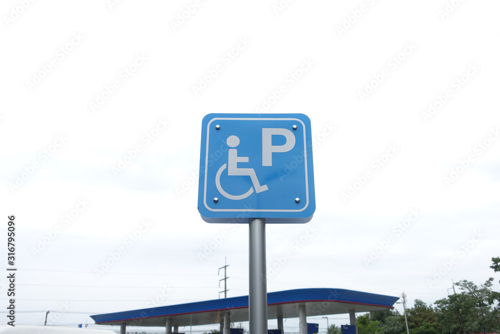Parking signs for the disabled in petrol stations.