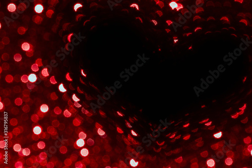 valentines day red abstract background with heart and glitter bokeh on black, valentines day card, abstract love bokeh shiny confetti textured template