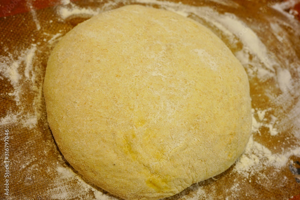 Making a ball with proofed yeast dough for miracle overnight no knead bread Making a ball with proofed yeast dough for miracle overnight no knead bread