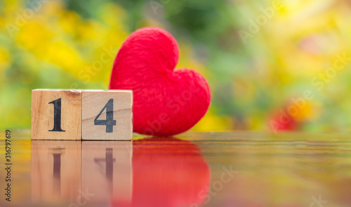 Wooden calendar show of 14 with red heart,valentines day.