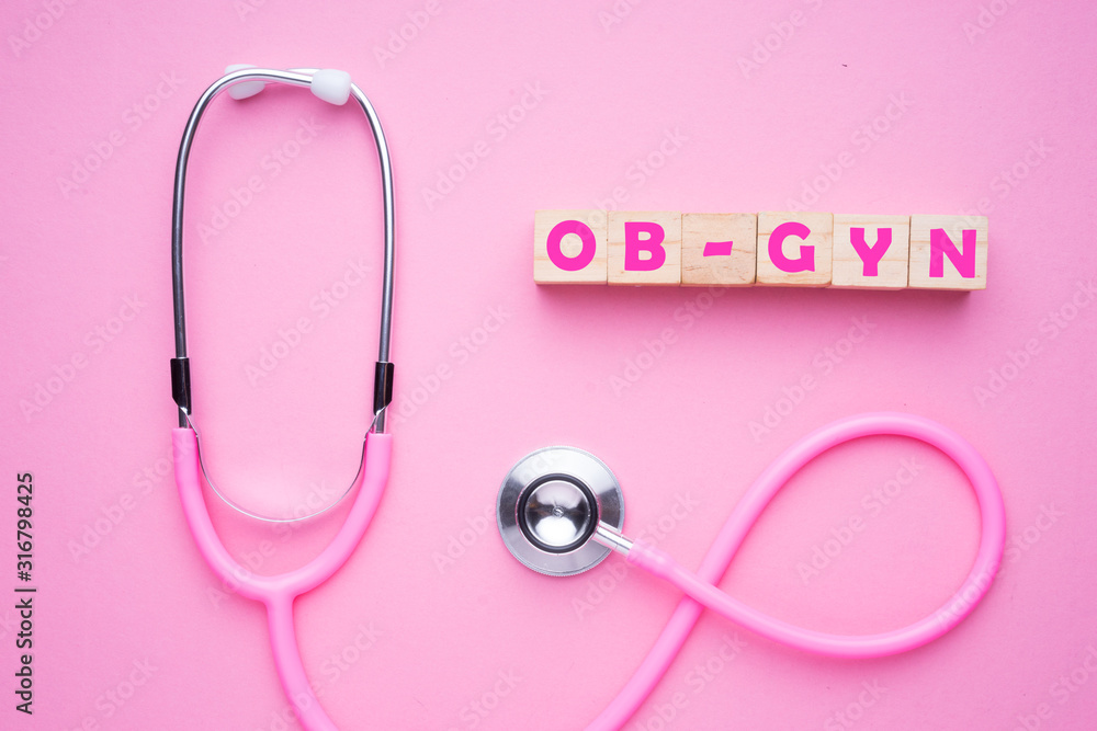 Women in healthcare concept. A pink strethoscope on a pink background ...