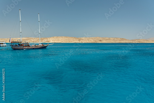 Egypt  Red Sea  blue clear water  view from the yacht to the horizon.