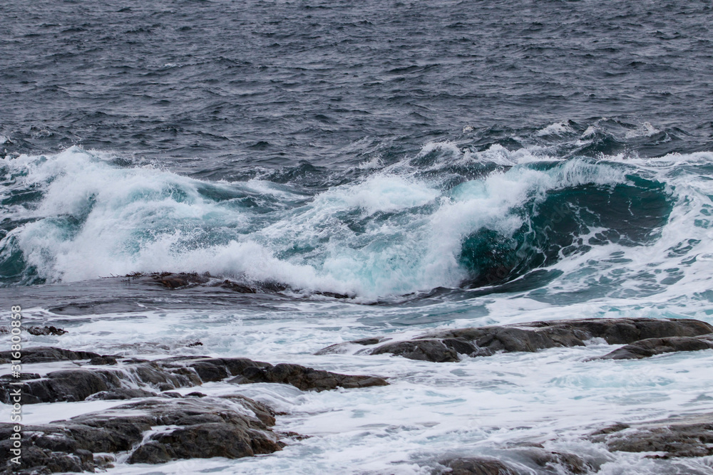 waves crashing on the rock