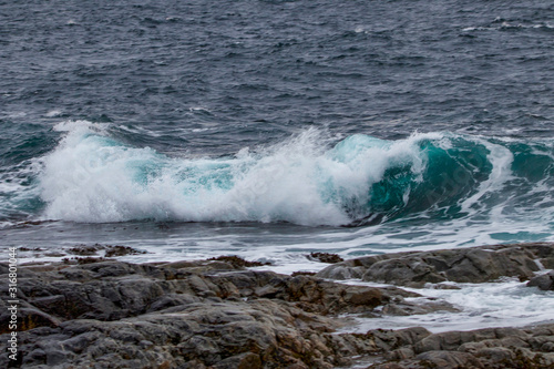 waves crashing on the rock