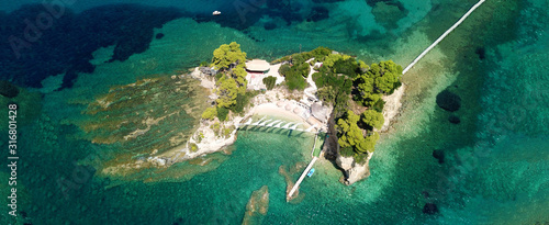 Aerial drone ultra wide photo of iconic small islet of Cameo near Laganas bay, Zakynthos island, Ionian, Greece