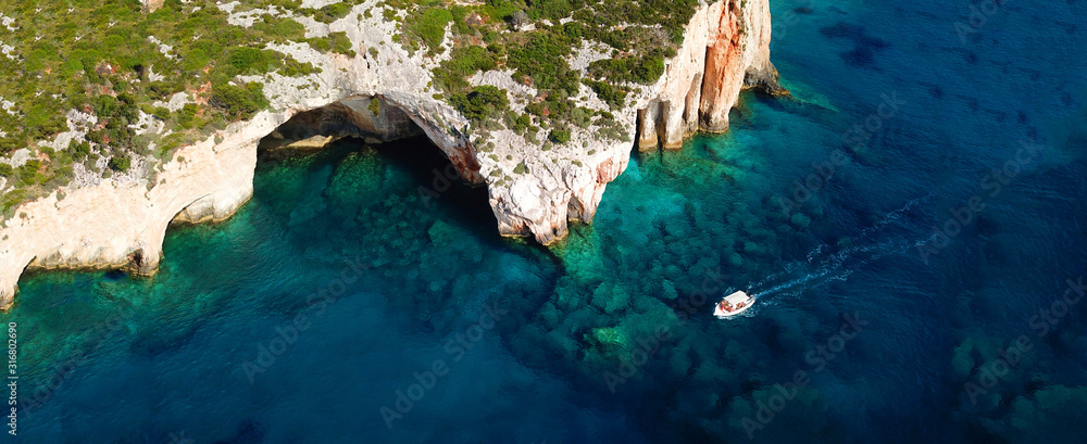 Obraz na płótnie Aerial drone ultra wide photo of famous blue caves in North part of Zaktynthos island, Ionian, Greece w salonie