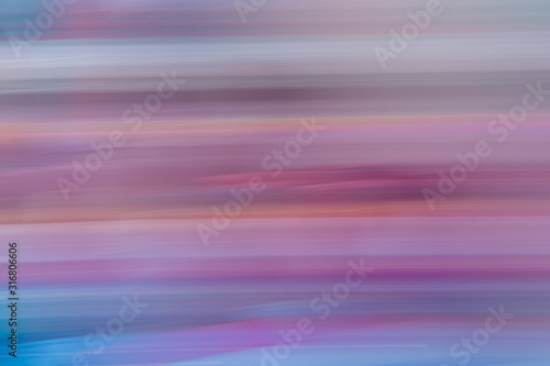 purple blue red colorful abstract background consisting of horizontal blur stripes