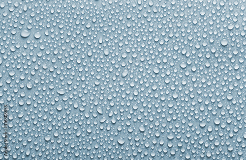 Wallpaper Mural Rain drops background, blue colored water drops texture Torontodigital.ca
