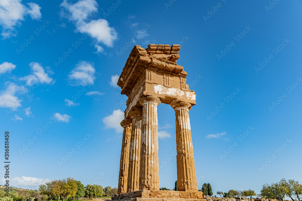 Temple of Dioscuri (Castor and Pollux). Famous ancient ruins in Valley of Temples, Agrigento, Sicily, Italy.