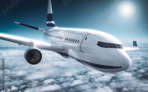 Fototapeta Passenger plane close up flying on cruising altitude - above clouds