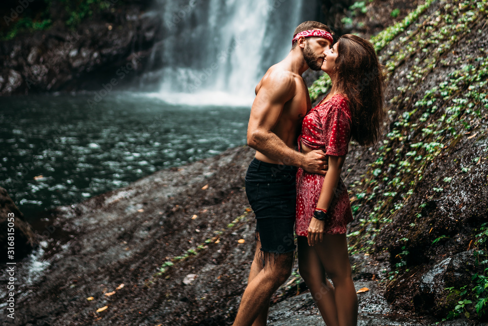 Beautiful Couple Kissing At The Waterfall A Couple In Love At A Beautiful Waterfall Wedding