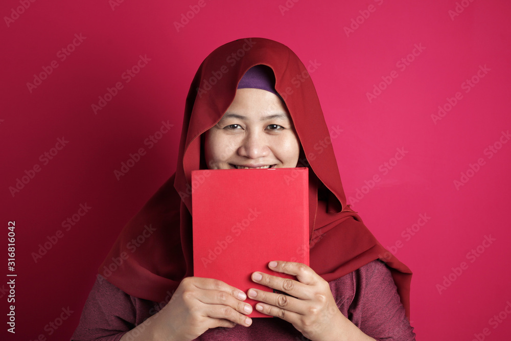 Happy Muslim Lady with Book Happy Muslim Lady with Book