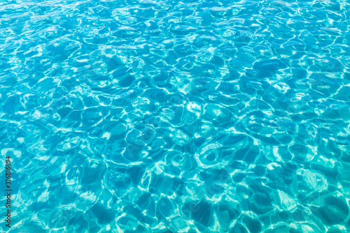 View of turquoise sea closeup, water background, horizontal picture