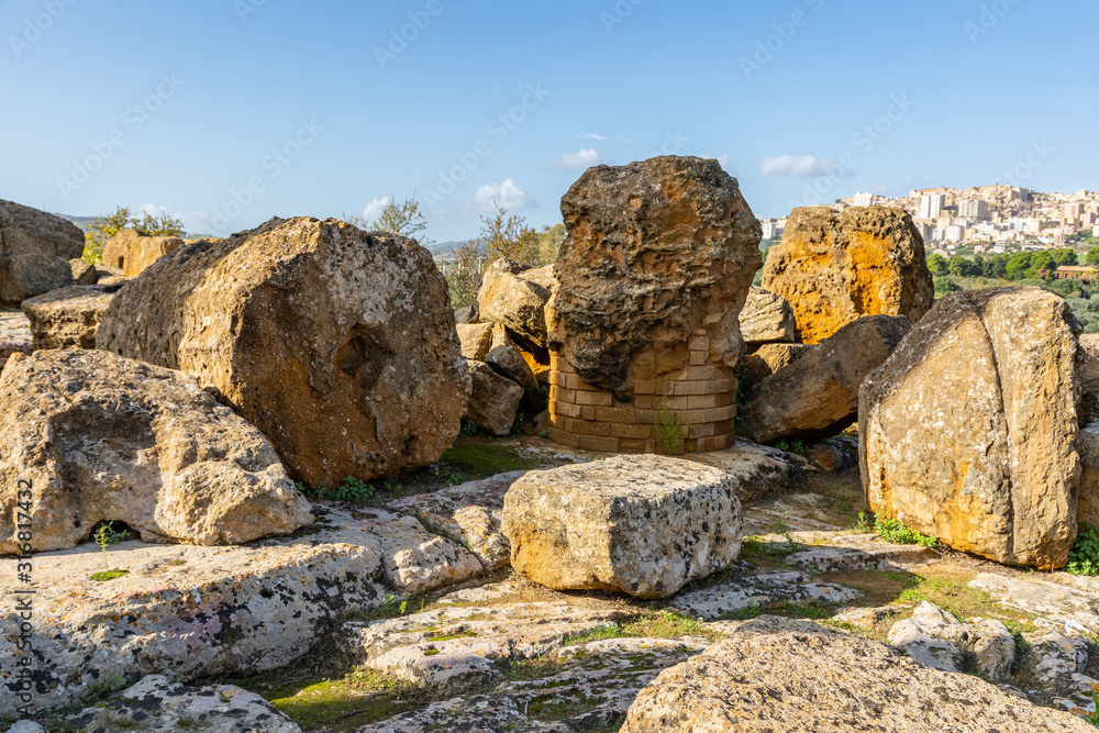 Ruined Temple of Heracles columns in famous ancient Valley of Temples in Agrigento, Sicily, Italy.