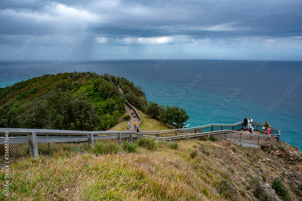 Fototapeta premium Cape Byron at Byron Bay Lighthouse Lookout over Vast Ocean and Australia most Eastern Point, New South Wales, Australia.