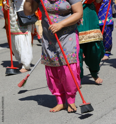 barefoot women of Sikh religious sweep