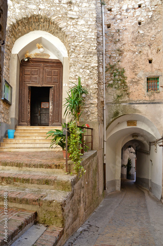 Castelcivita, Italy. A narrow street between the old houses of a medieval village © Giambattista