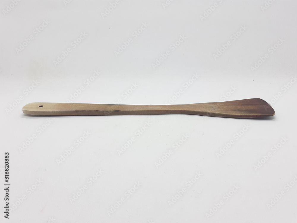 Beautiful Natural Dark Brown Wooden Spoon Spatula in White Isolation Background Beautiful Natural Dark Brown Wooden Spoon Spatula in White Isolation Background